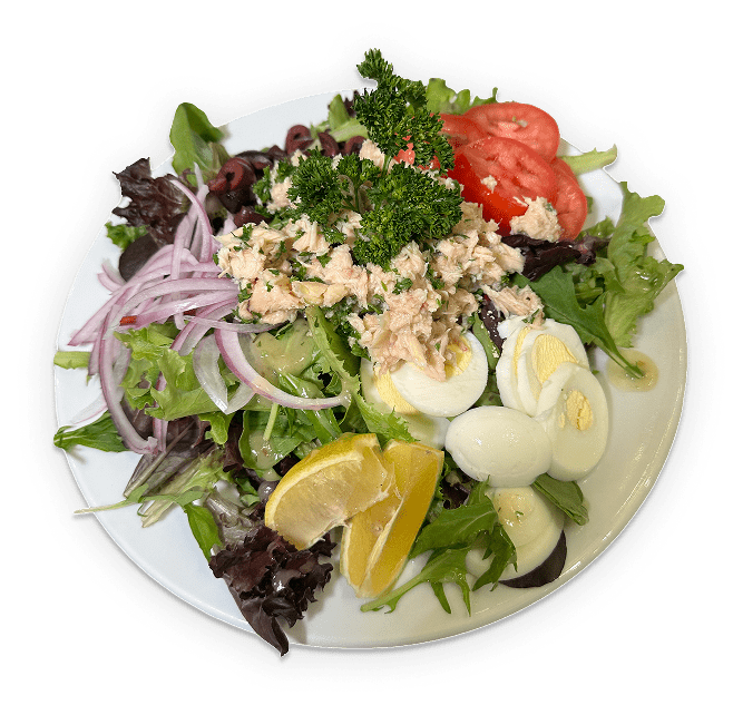 Fresh salad with eggs, tuna, and lemon.